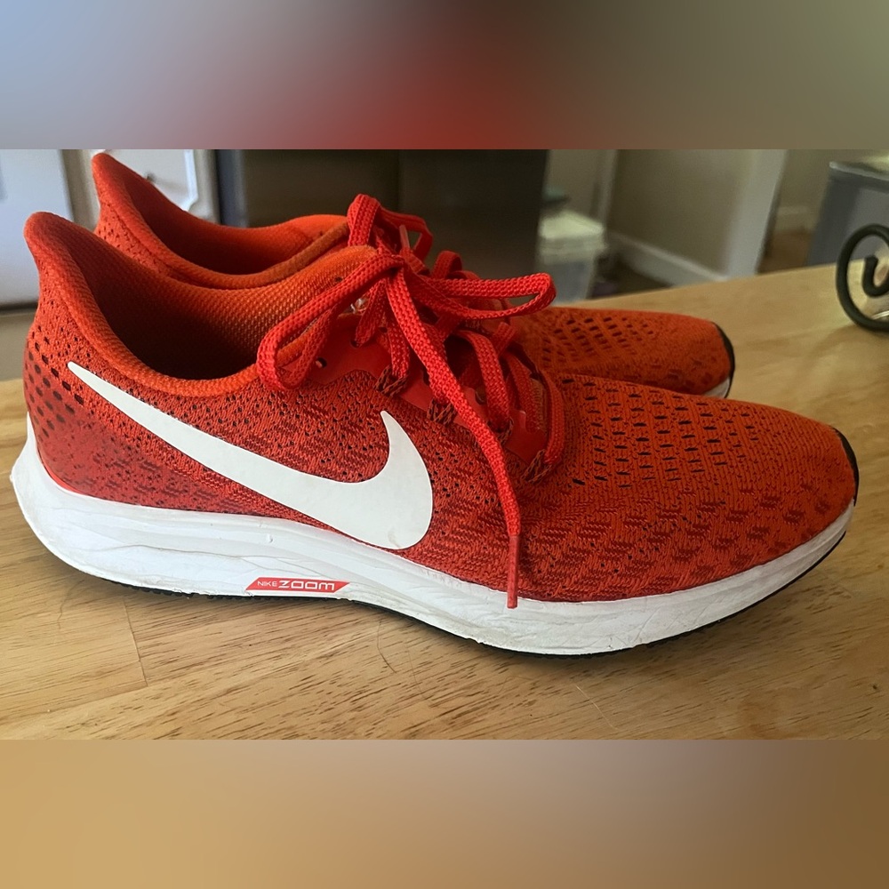 Woman’s Nike Orange Running Zoom Pegasus size 8